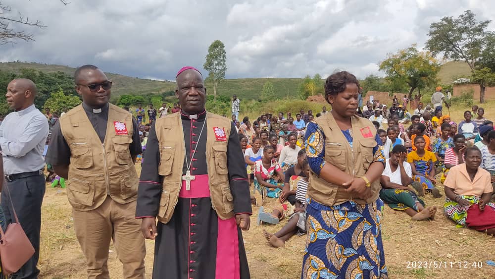 His grace THomas Luke Msusa, Mandinda and Tambala handing over entitlements